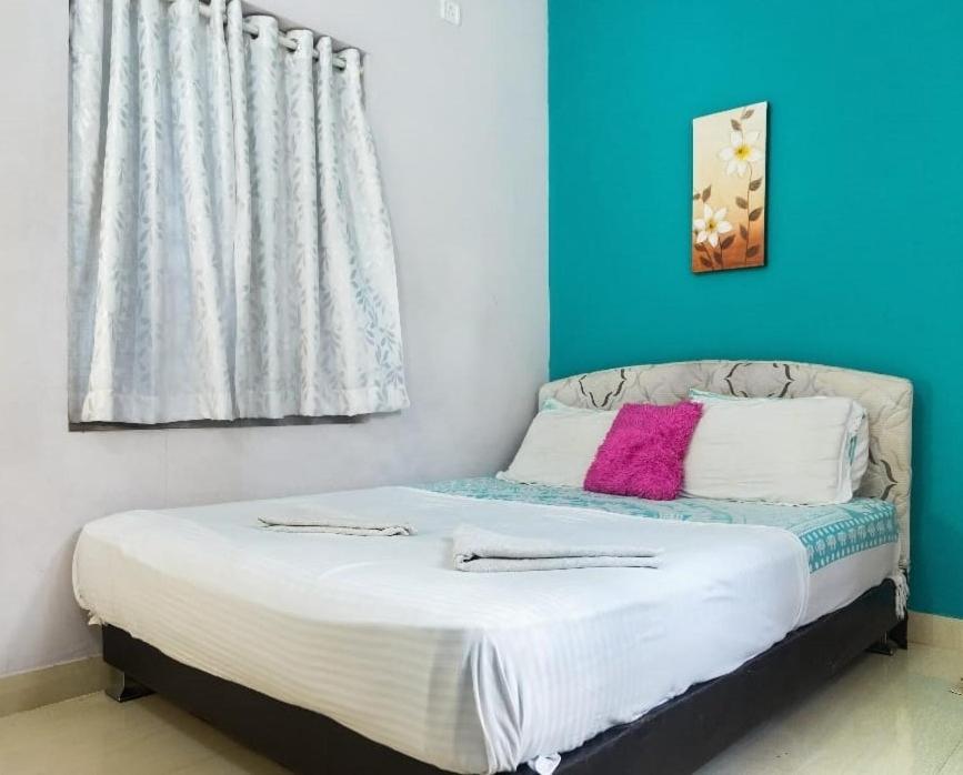 Postel nebo postele na pokoji v ubytování Niyanest Holidayhome