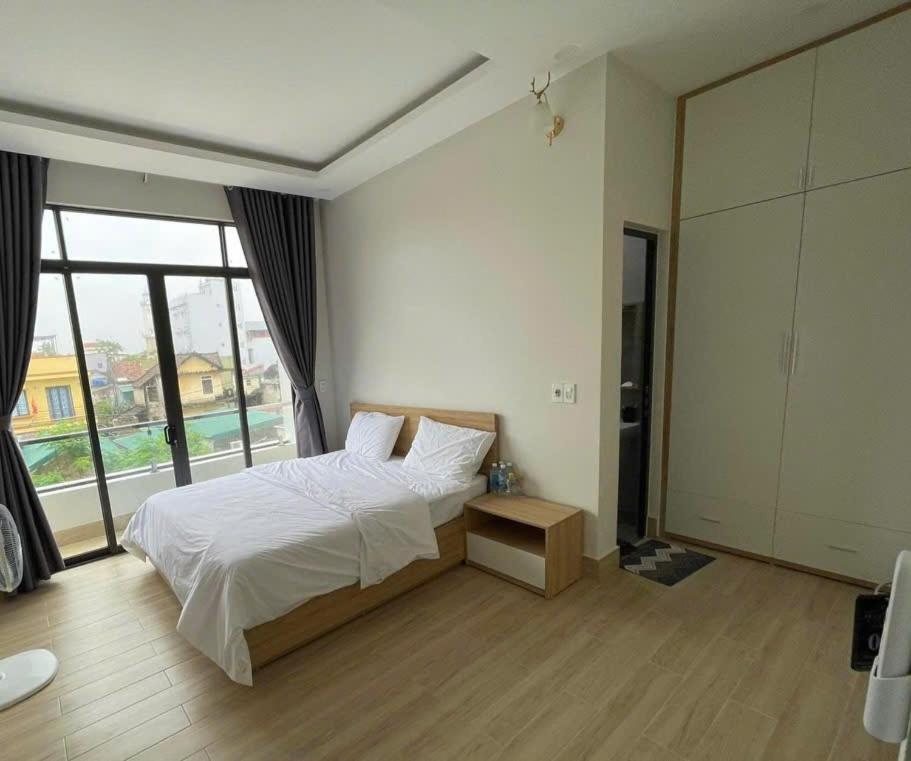 Postel nebo postele na pokoji v ubytování Pi House Homestay