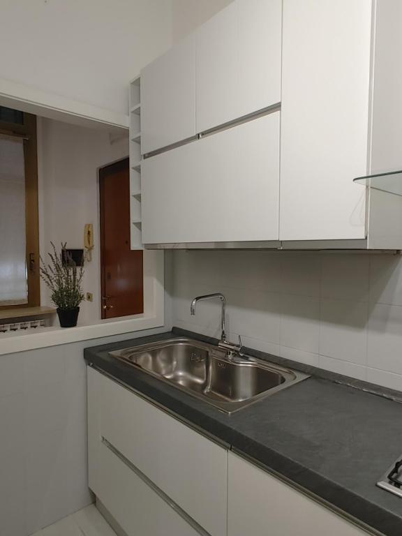 Kuchyň nebo kuchyňský kout v ubytování Mazzini Apartment - THE V Collection