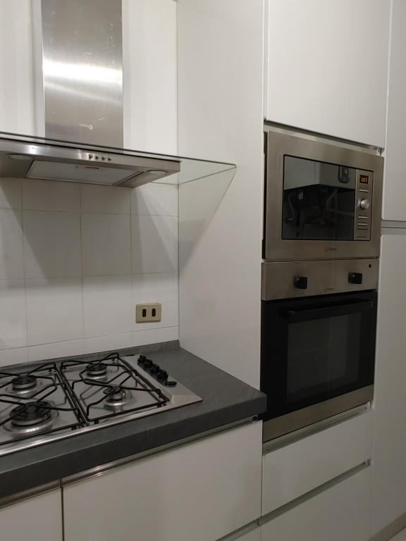 Kuchyň nebo kuchyňský kout v ubytování Mazzini Apartment - THE V Collection