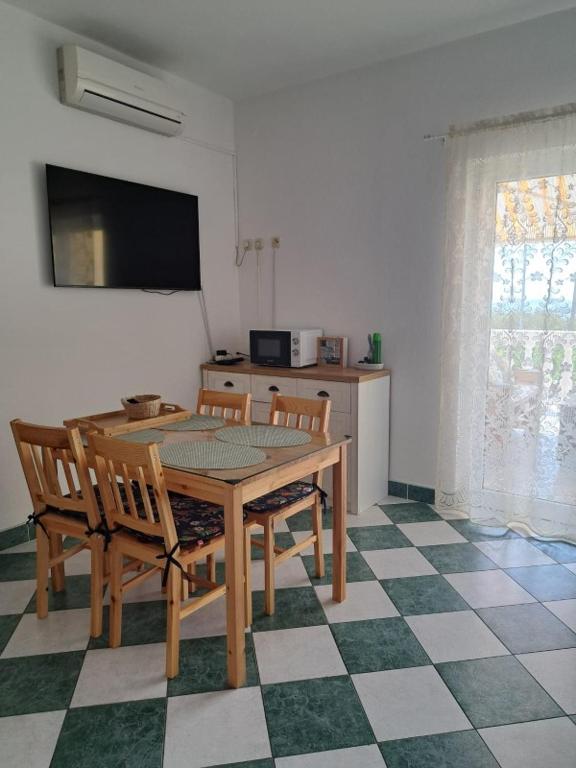 TV a/nebo společenská místnost v ubytování Apartman Laura