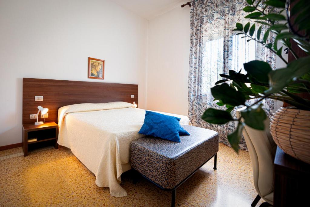 Posteľ alebo postele v izbe v ubytovaní Locanda Al Santuario