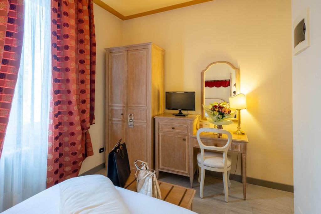 TV a/nebo společenská místnost v ubytování Hotel Manzoni Wellness&Spa
