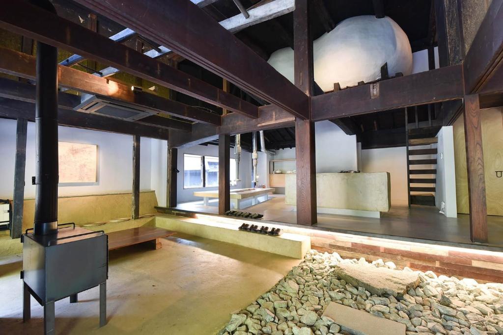 a large room with a stove in a building at glaminka SAYO - YOUBI - Vacation STAY 85066v in Furumachi