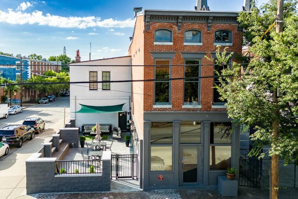 a brick building on a city street at Downtown Kentucky Home Perfect for Groups in Louisville