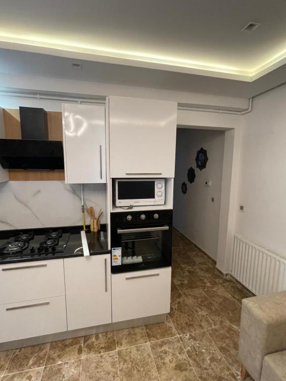Kuchyň nebo kuchyňský kout v ubytování Appartement s2 a tunis