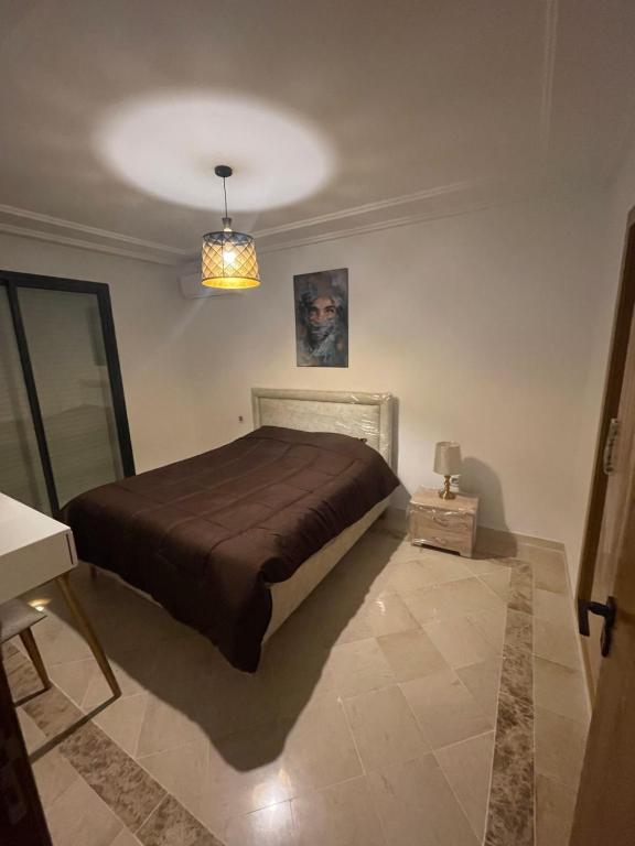 Postel nebo postele na pokoji v ubytování Appartement s2 a tunis