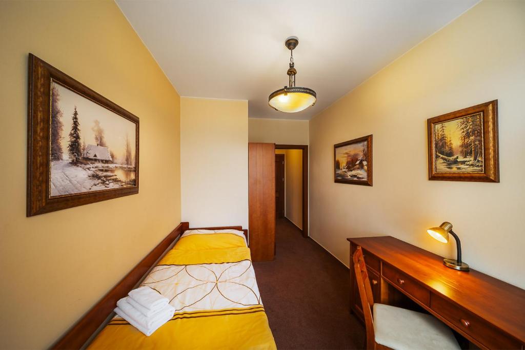 Postel nebo postele na pokoji v ubytování JazzPenzion