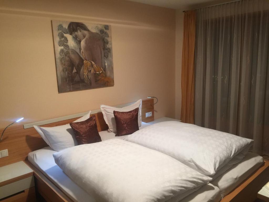 Postel nebo postele na pokoji v ubytování Haus Zudrell