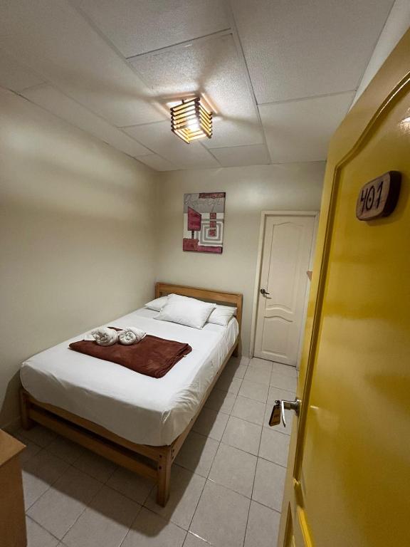 Postel nebo postele na pokoji v ubytování Chescos Hotel