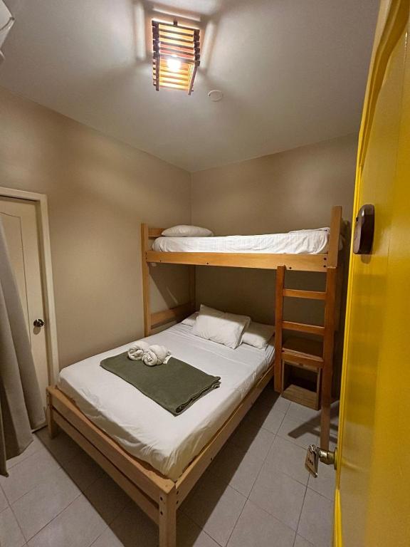 Postel nebo postele na pokoji v ubytování Chescos Hotel