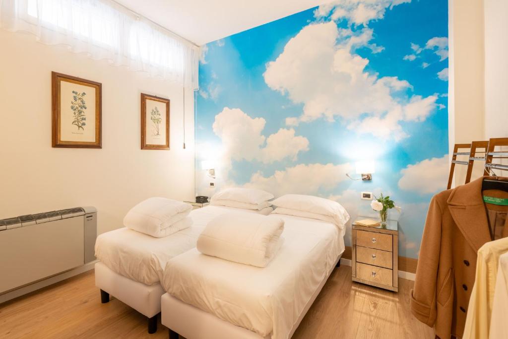 Postel nebo postele na pokoji v ubytování Hotel Manzoni Wellness&Spa