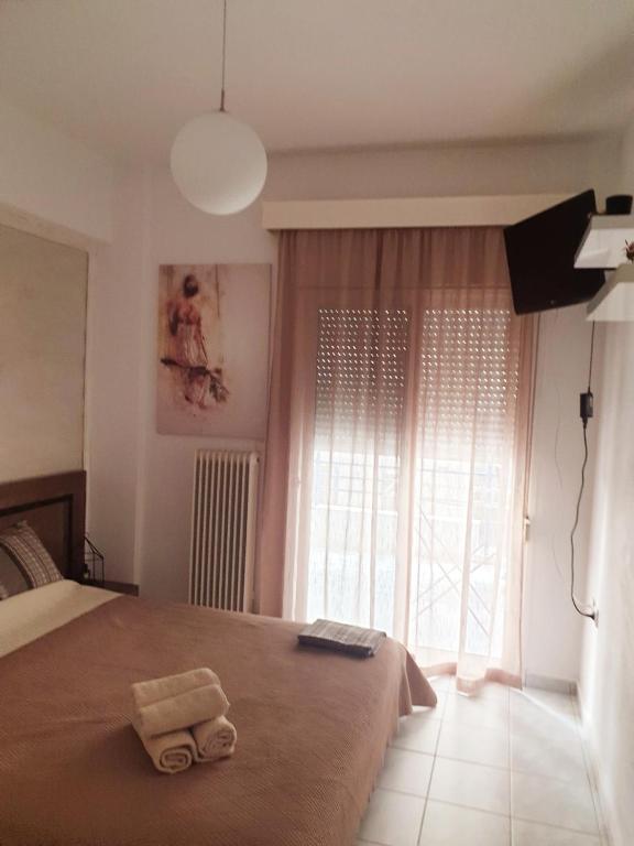 Postel nebo postele na pokoji v ubytování Άνετο και όμορφο διαμέρισμα