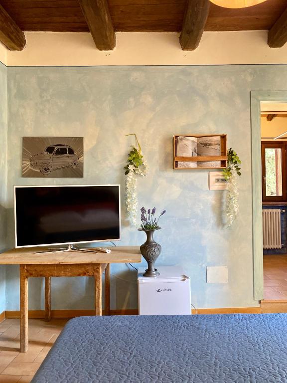 TV a/nebo společenská místnost v ubytování Chateaux de Pep