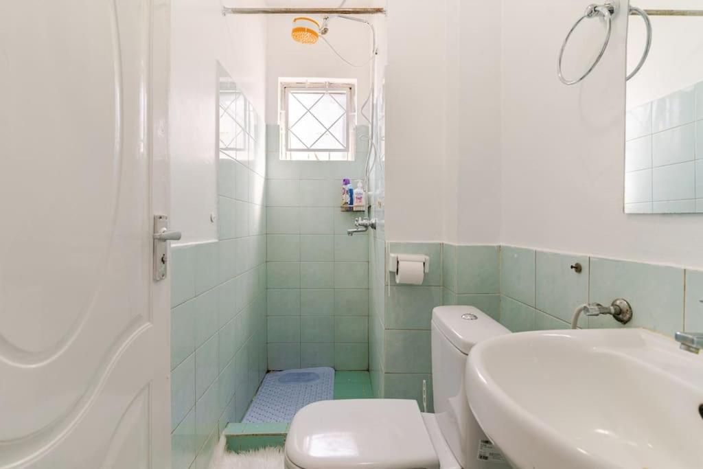 Koupelna v ubytování Saruni Homes