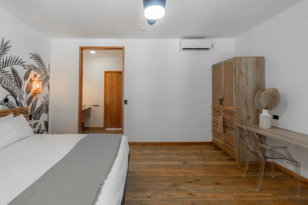 Postel nebo postele na pokoji v ubytování S Boutique Hotel