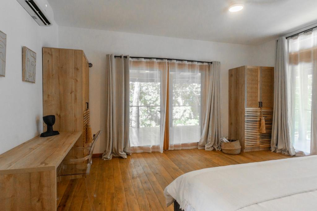 Postel nebo postele na pokoji v ubytování S Boutique Hotel