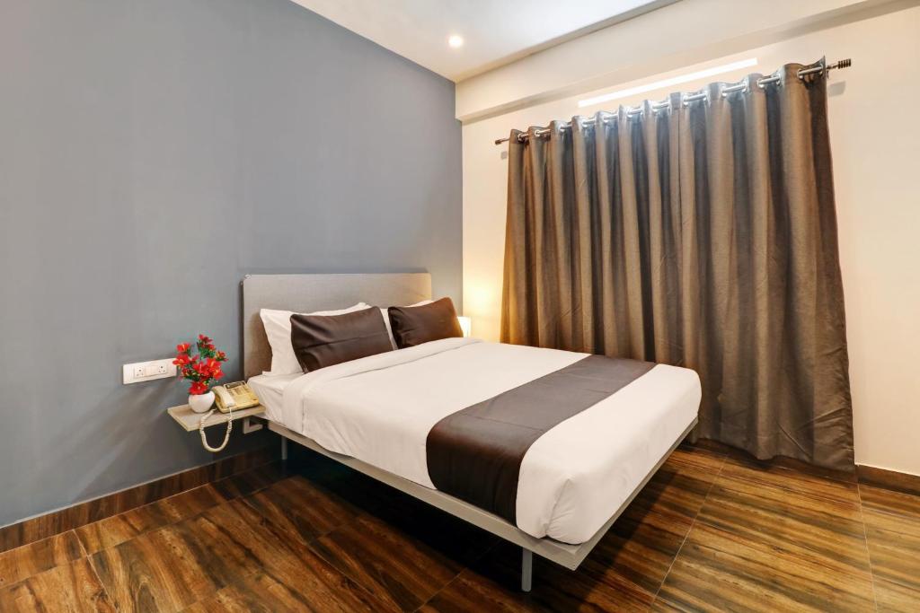 Postel nebo postele na pokoji v ubytování Super Townhouse XOTEL