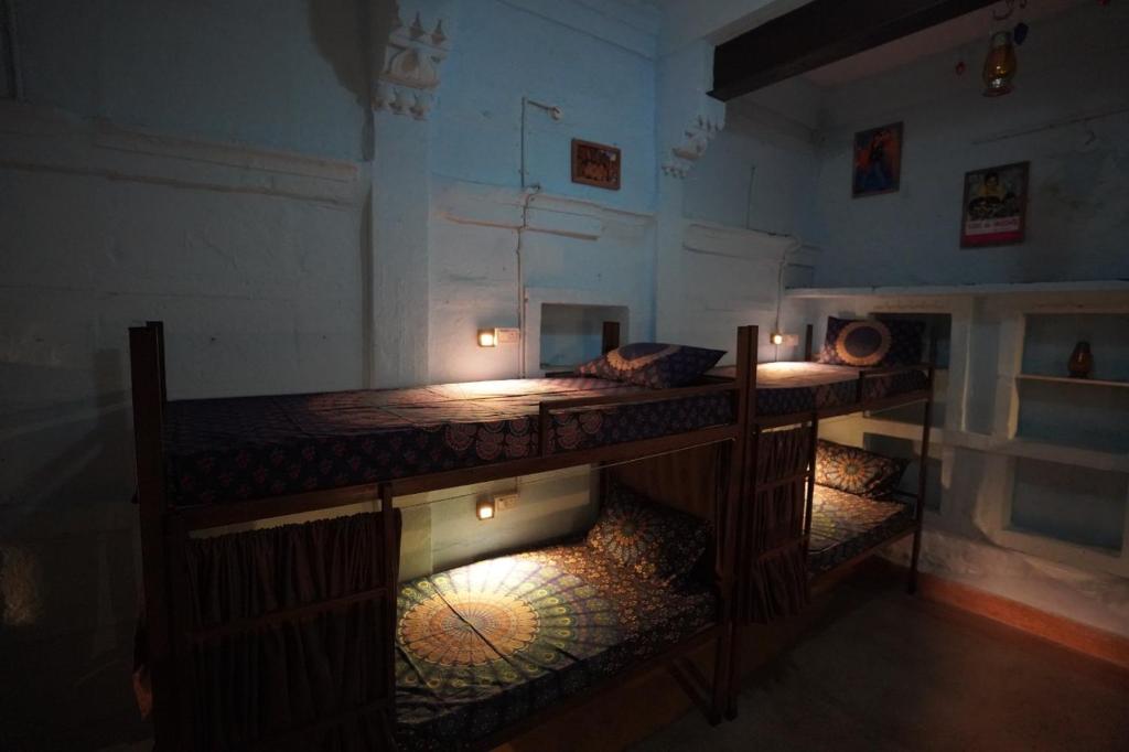 Postel nebo postele na pokoji v ubytování BlaBla Hostel