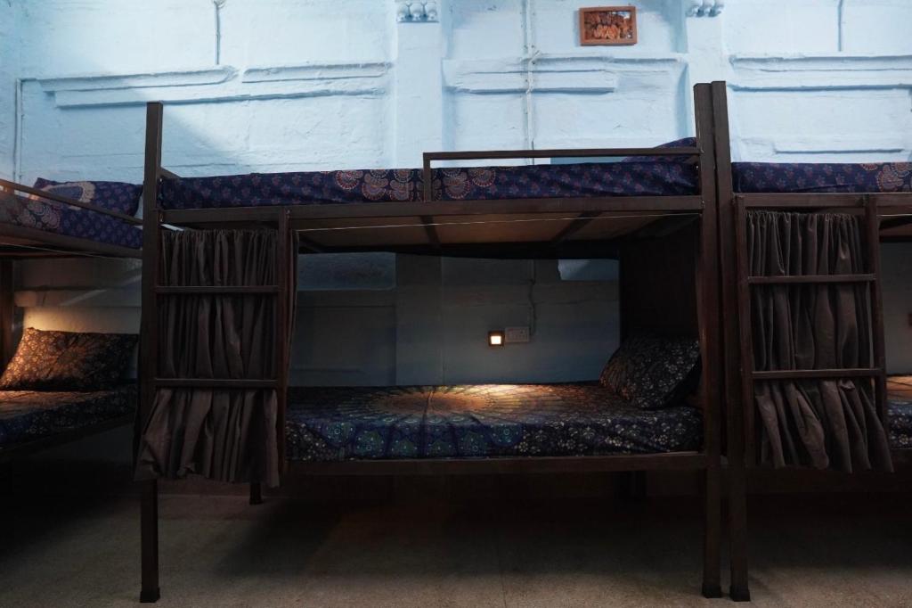 Postel nebo postele na pokoji v ubytování BlaBla Hostel
