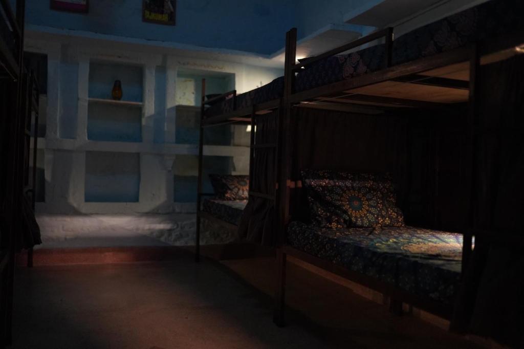 Postel nebo postele na pokoji v ubytování BlaBla Hostel