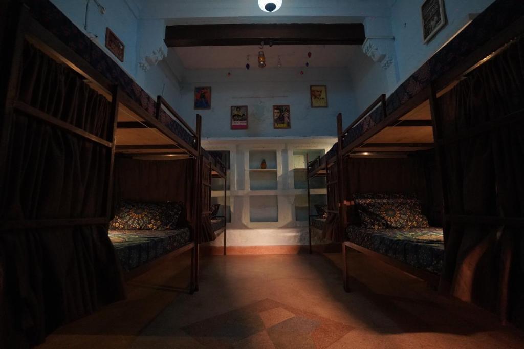 Postel nebo postele na pokoji v ubytování BlaBla Hostel