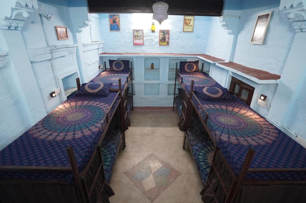 Postel nebo postele na pokoji v ubytování BlaBla Hostel