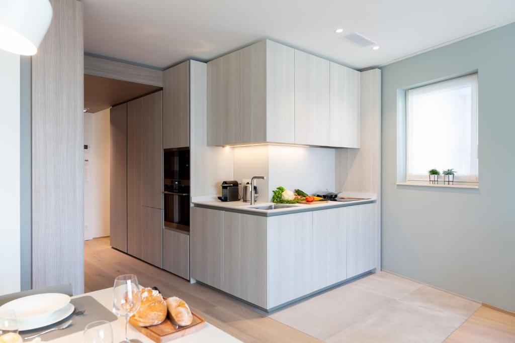 Kuchyň nebo kuchyňský kout v ubytování The Central City - Luxury Serviced Residence