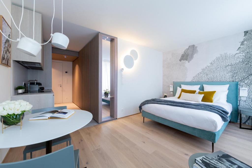 Postel nebo postele na pokoji v ubytování The Central City - Luxury Serviced Residence