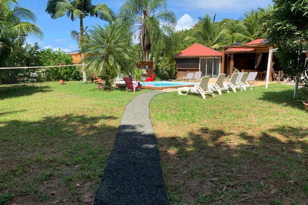 Zahrada ubytování Suite Lagoon climatisée avec piscine, spa privatif