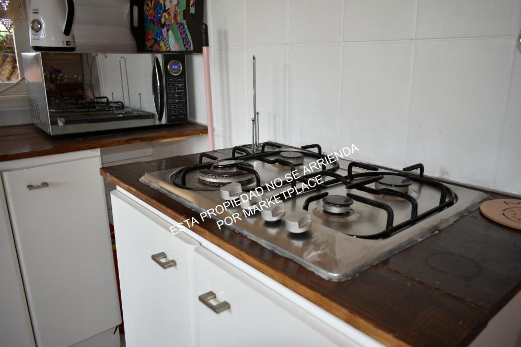 Kuchyň nebo kuchyňský kout v ubytování Piscina Climatizada Privada, Cabaña, Quincho, Limache