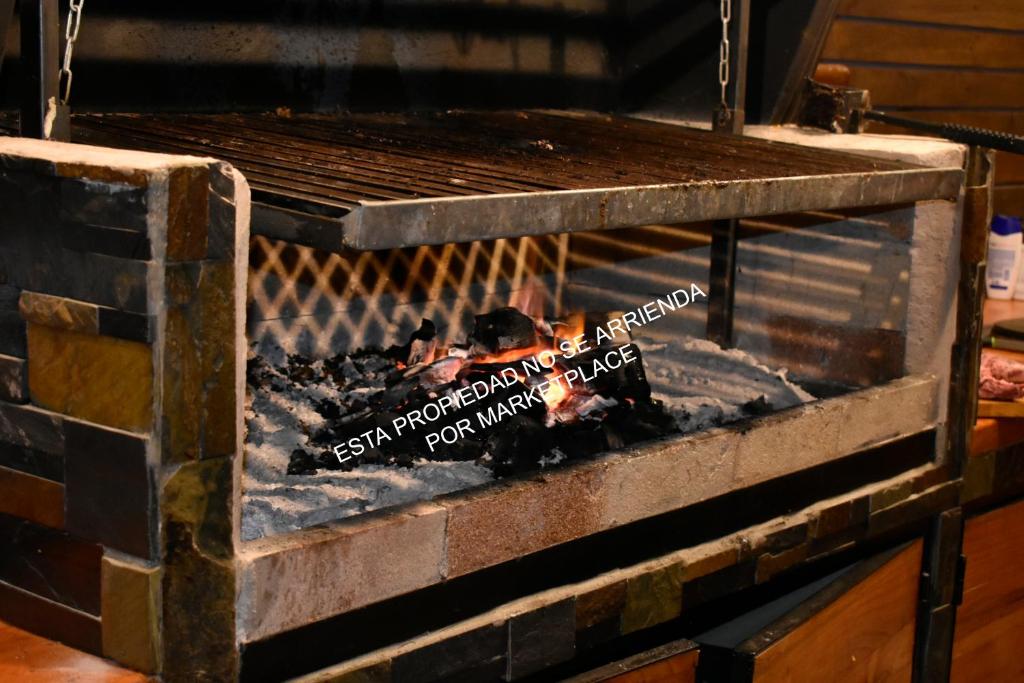 Gril dostupný pro hosty v prázdninového domu