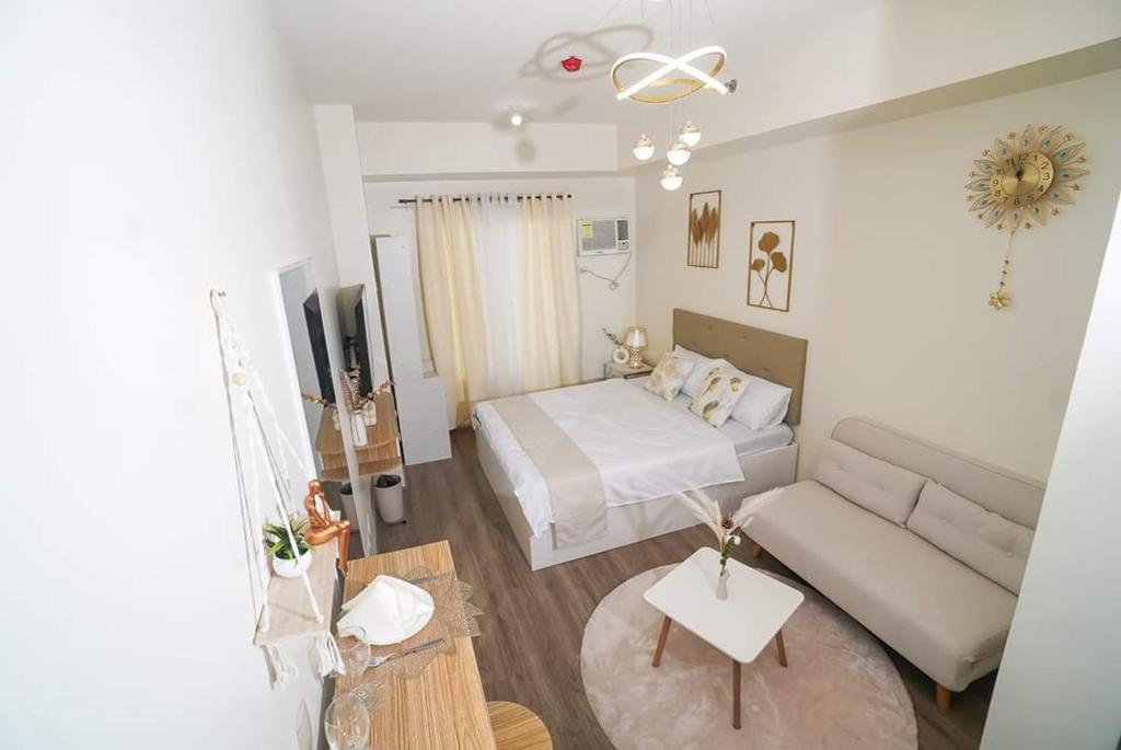 Ένα ή περισσότερα κρεβάτια σε δωμάτιο στο THE MEDIAN condo near IT PARK