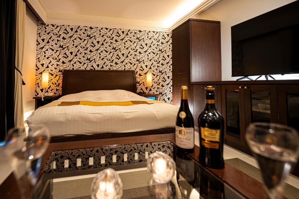 Postel nebo postele na pokoji v ubytování HOTEL LOTUS Superior RESORT NRT