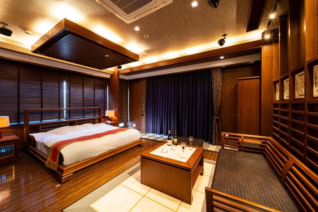 Postel nebo postele na pokoji v ubytování HOTEL LOTUS Superior RESORT NRT