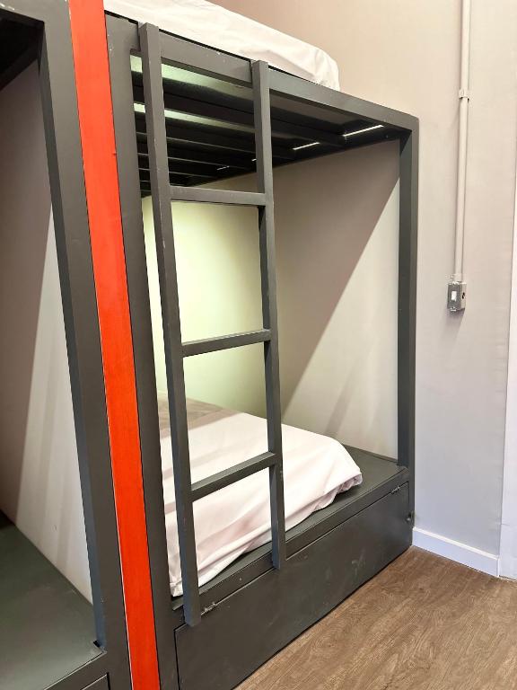 Postel nebo postele na pokoji v ubytování Hostel Distrito 011
