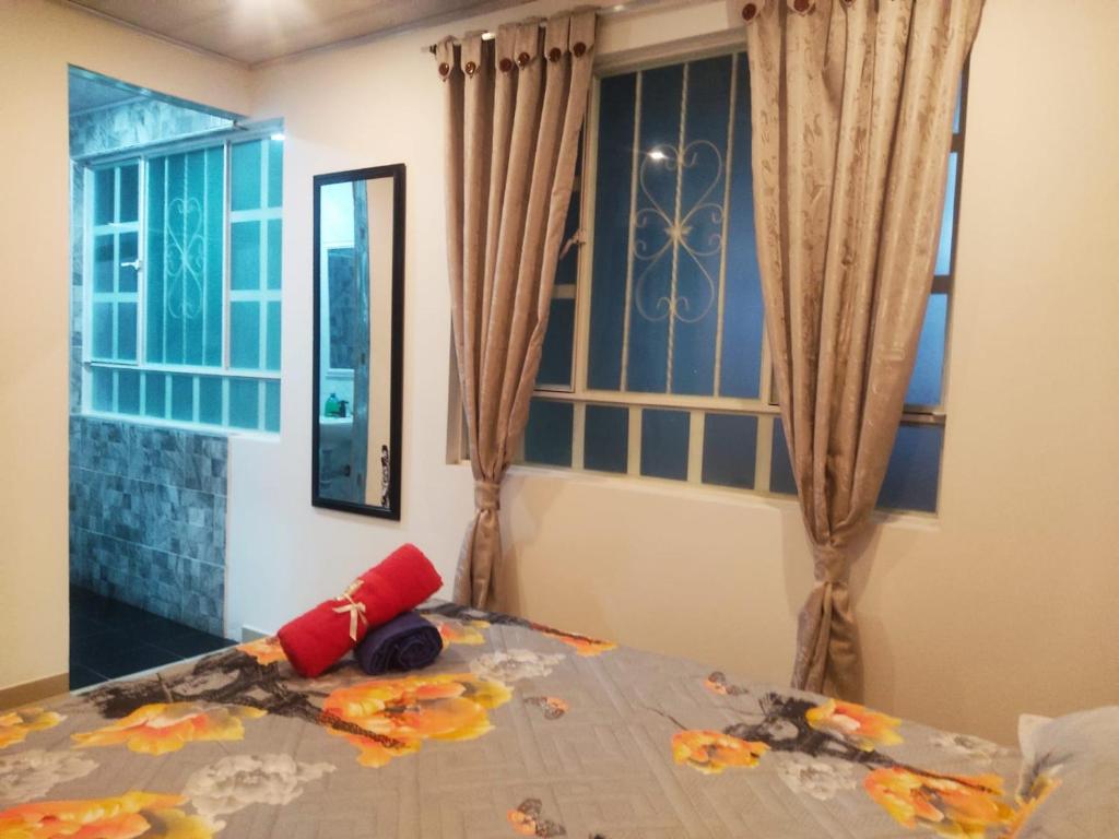 Postel nebo postele na pokoji v ubytování C habitación con baño privado