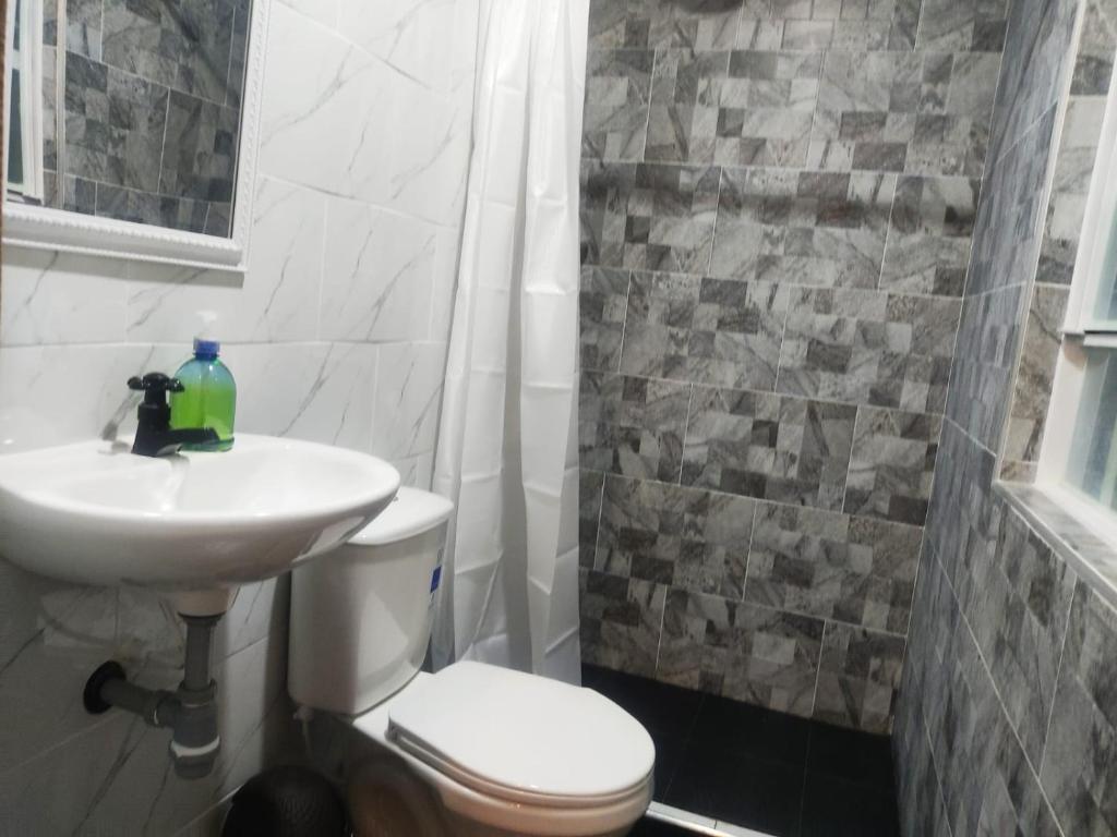 Koupelna v ubytování C habitación con baño privado