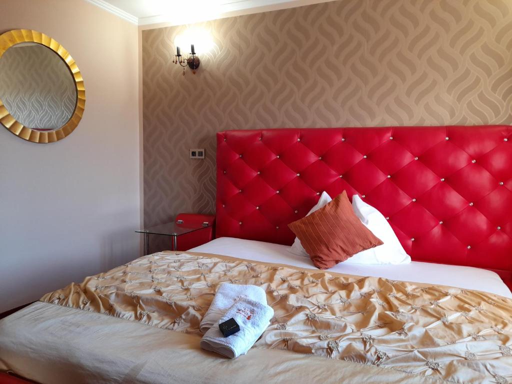 Łóżko lub łóżka w pokoju w obiekcie Wellness Hotel Beethoven