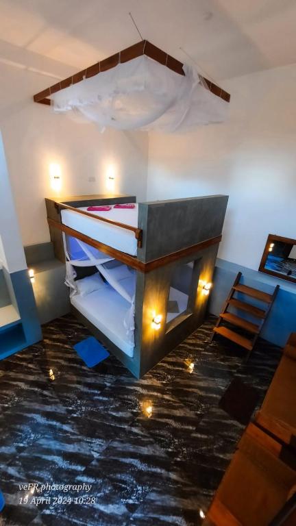 Postel nebo postele na pokoji v ubytování Jungle Escape Hiriketiya