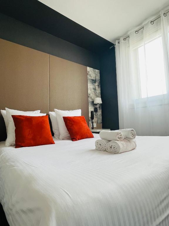 Postel nebo postele na pokoji v ubytování L'Hôtel Bristol
