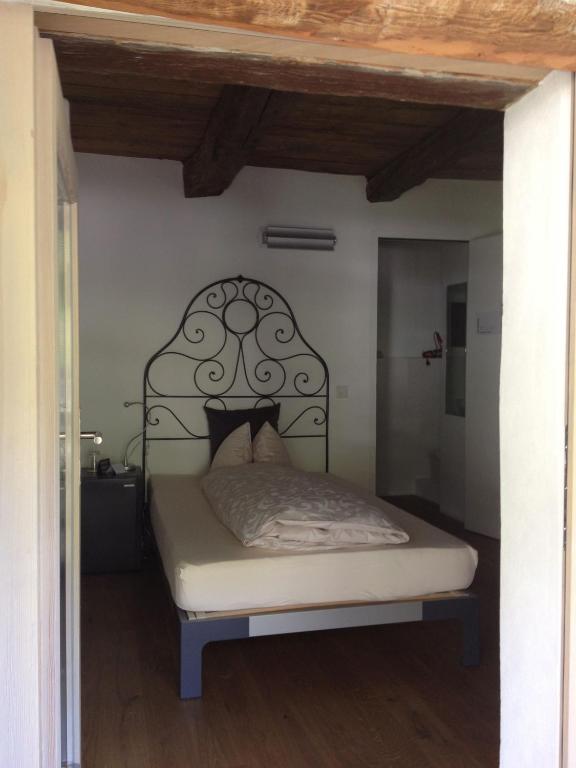 Postel nebo postele na pokoji v ubytování Casa Martinelli, Boutique-Hotel