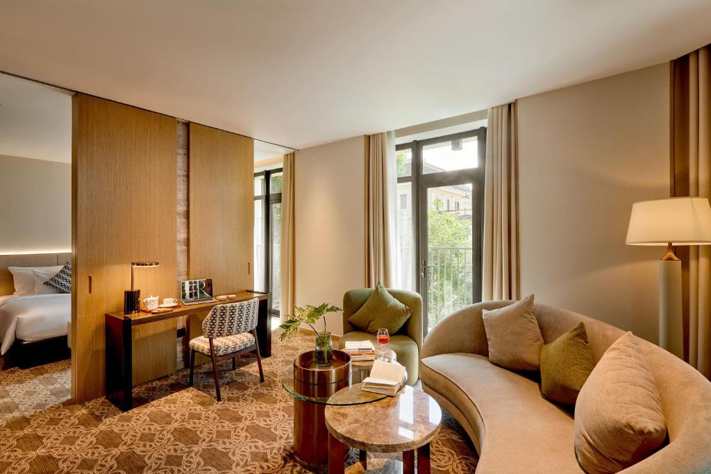 Postel nebo postele na pokoji v ubytování REY Hotel Hanoi