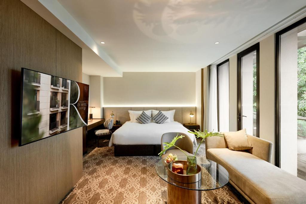 Postel nebo postele na pokoji v ubytování REY Hotel Hanoi