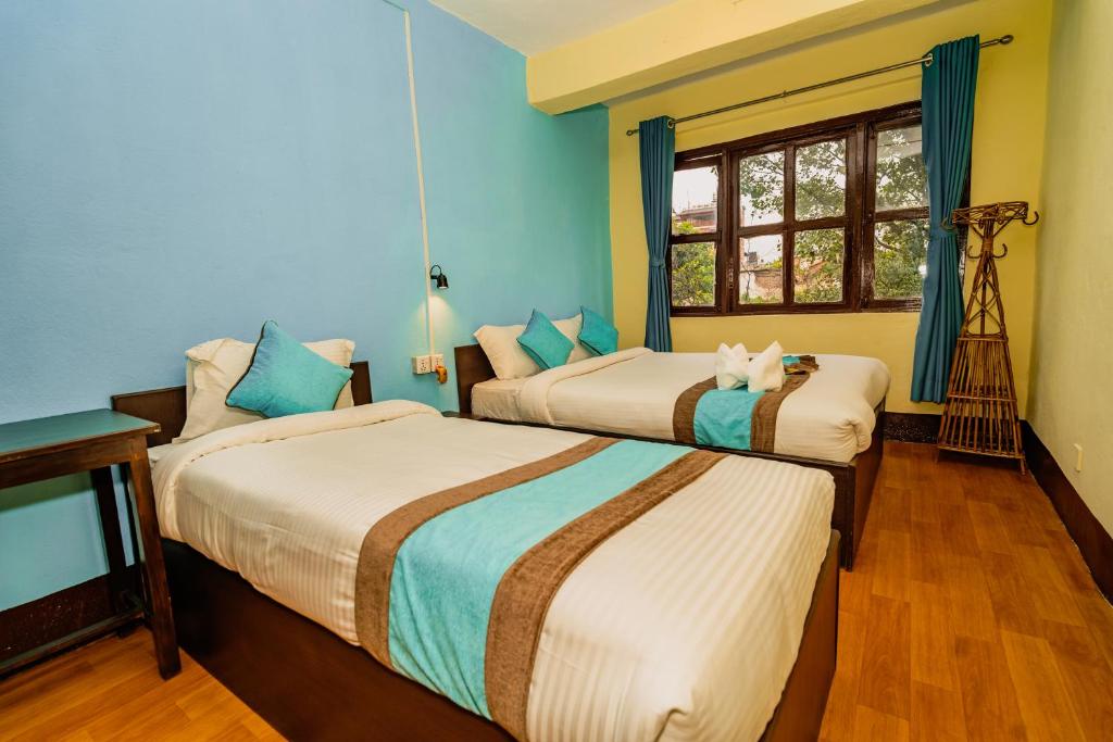 Postel nebo postele na pokoji v ubytování Rest Up Kathmandu Hostel