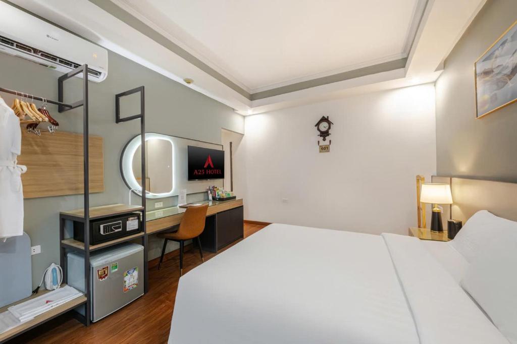 Postel nebo postele na pokoji v ubytování A25 Hotel - 12 Phố Huế