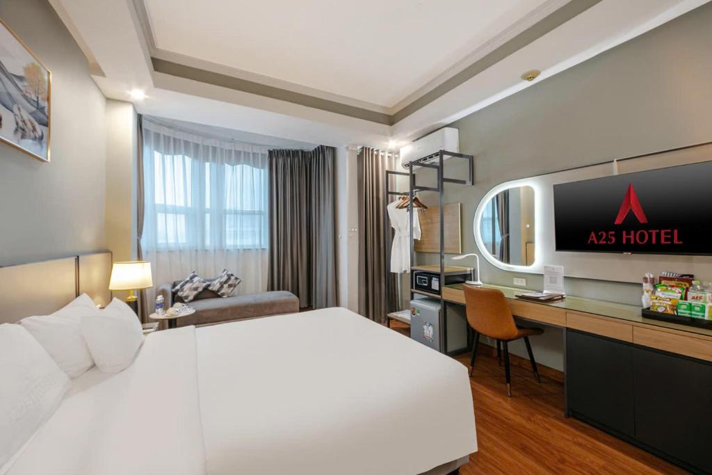 Postel nebo postele na pokoji v ubytování A25 Hotel - 12 Phố Huế
