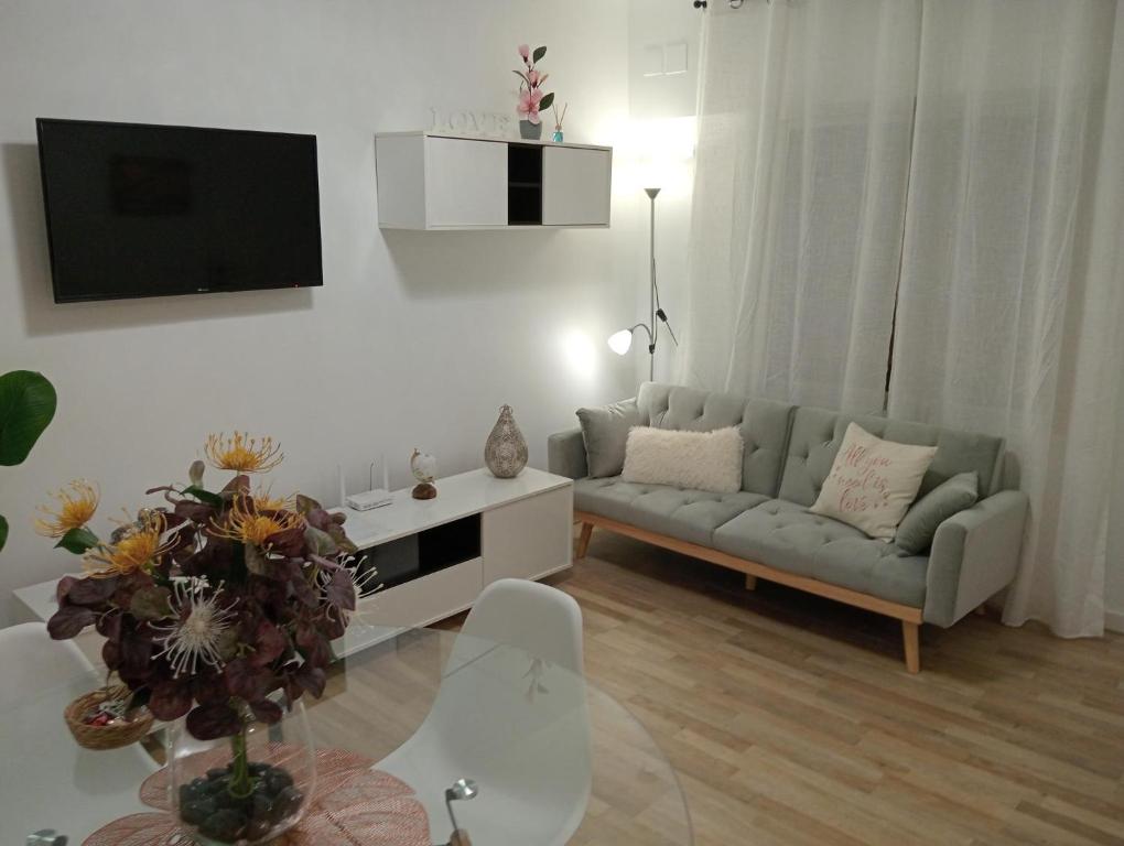 A seating area at Amor, emoción y más, Auténtico apartamento céntrico climatizado,con wifi, cercano a la catedral y estaciones