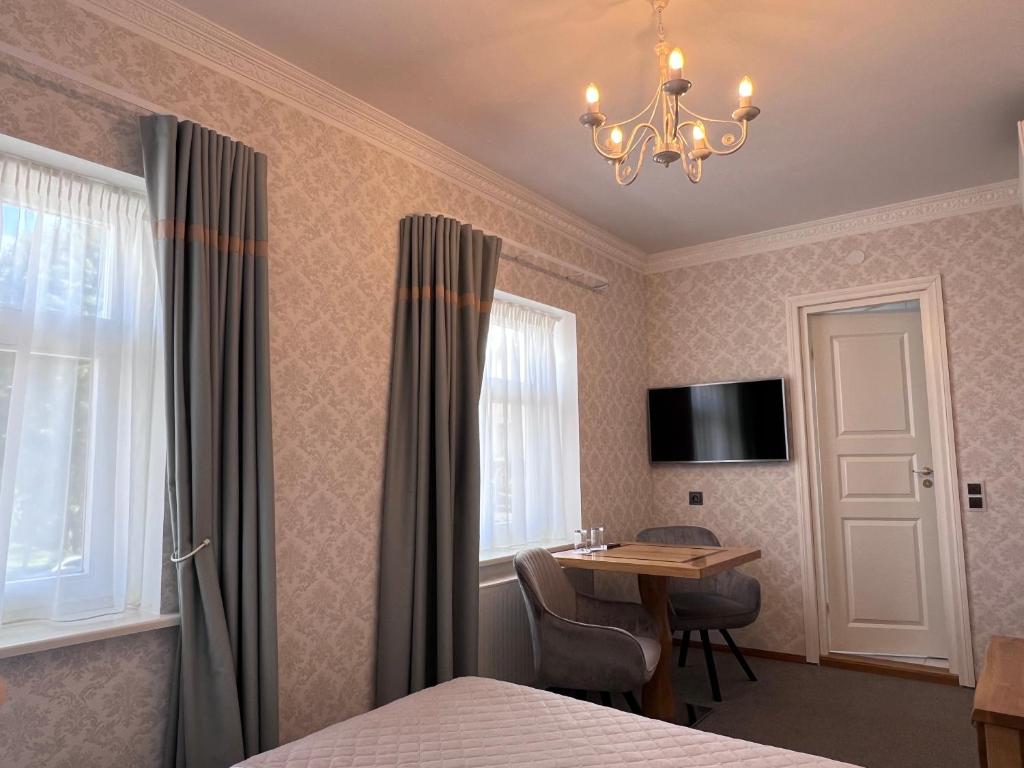 TV a/nebo společenská místnost v ubytování Ränduri Guesthouse