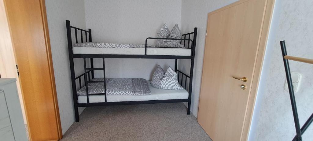 Postel nebo postele na pokoji v ubytování Am Forellenteich